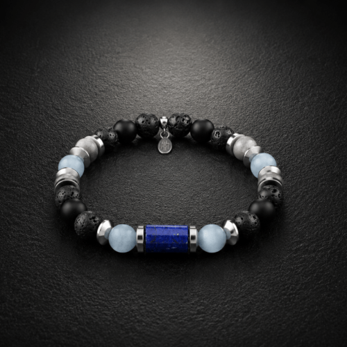 B104 – Bransoletka z Lapisu Lazuli, Akwamarynu, Labradorytu, Onyksu, Lawy Wulkanicznej i Hematytu Bransoletka z naturalnego lapisu lazuli, akwamarynu, labradorytu, onyksu, lawy wulkanicznej i hematytu na gumce jubilerskiej ze stalą szlachetną